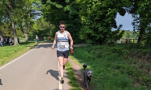 Owain doing his warm up run with his dog Toby